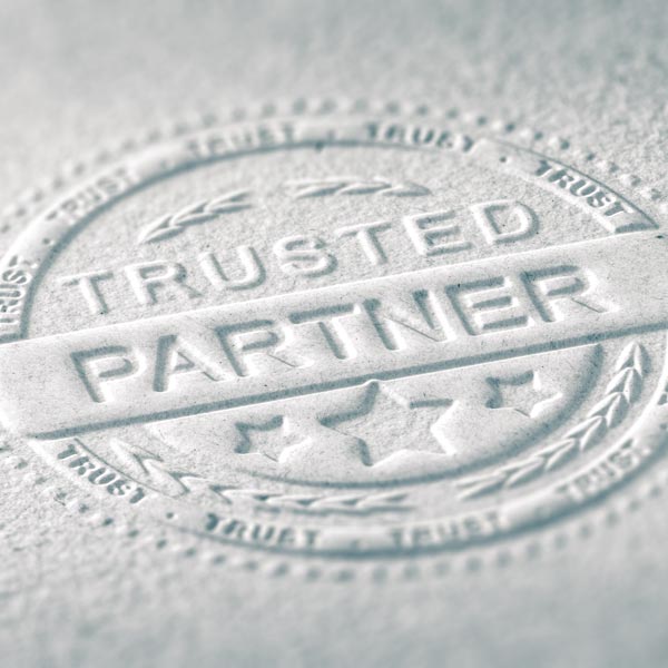 trusted partner seal embossed in paper